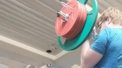 50 kg (110 lbs) biceps curl 2 reps & 60 kg (138 lbs) cheat curl 2 reps