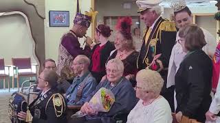 Hollis Schwartz being knighted by St Paul Winter Carnival Royalty May 8 2026