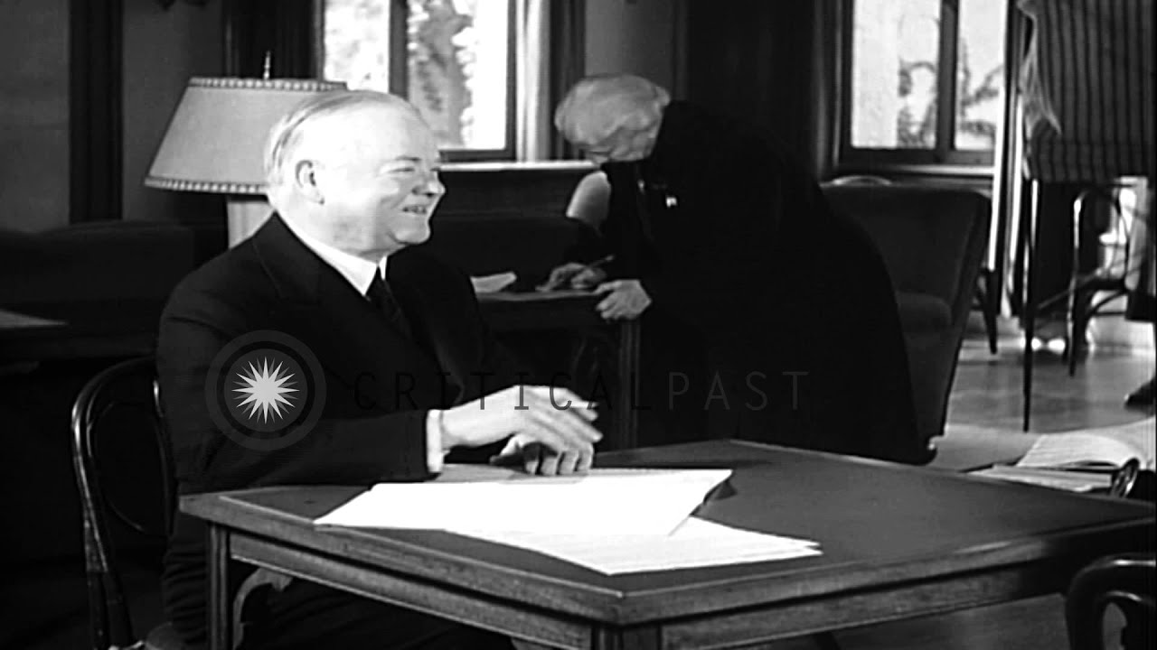Former President and Mrs. Herbert Hoover voting in 1940 Presidential election HD Stock Footage