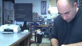 Classical guitar changing strings and tuning.avi