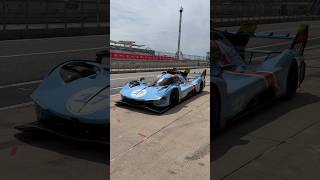 Fresh off a series of high-speed laps, the Ferrari 499P Modificata heads back into the paddock.