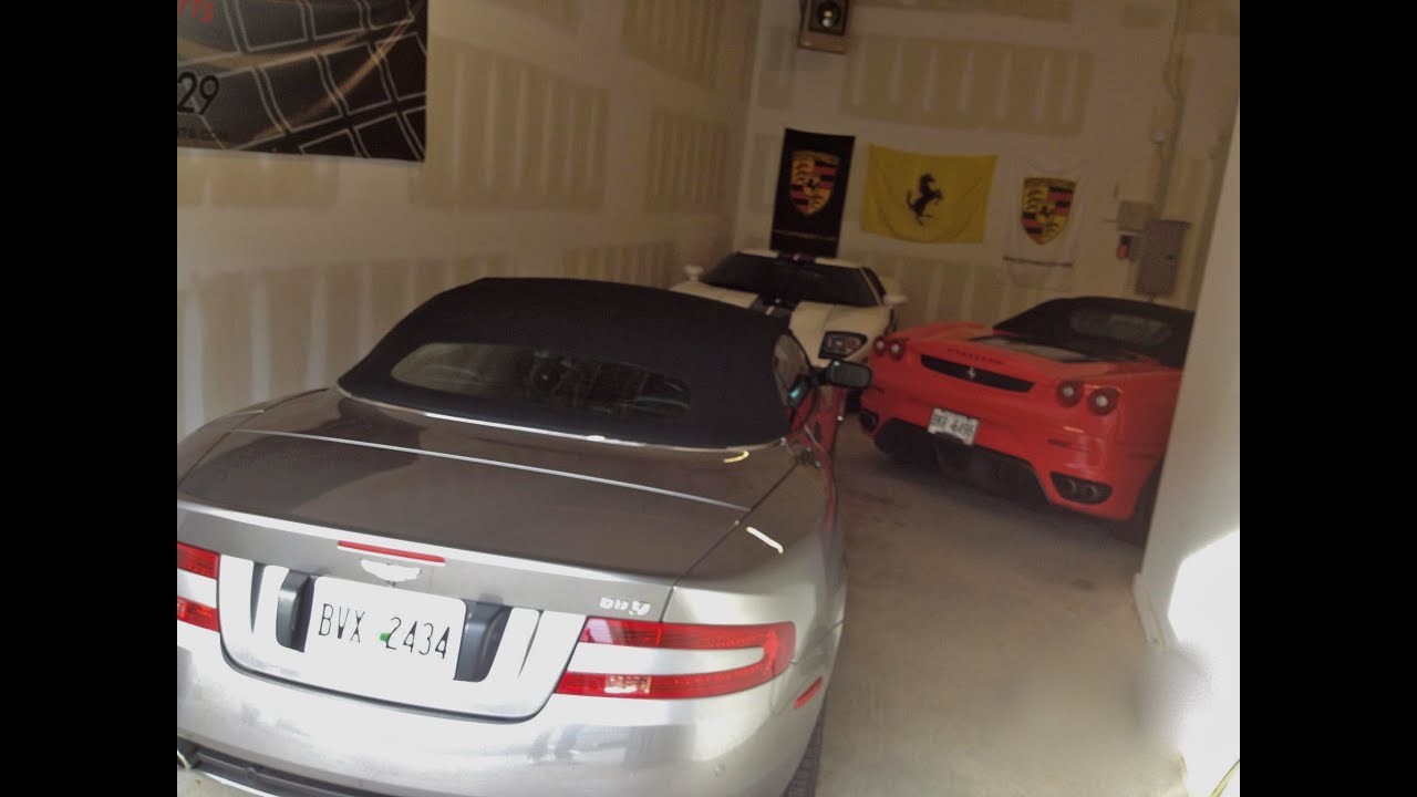 Warehouse full of exotics - Ferrari, Ford GT, and an Aston Martin!