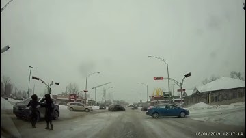 MUST SEE!!! SUV blows red light and hits two pedestrians