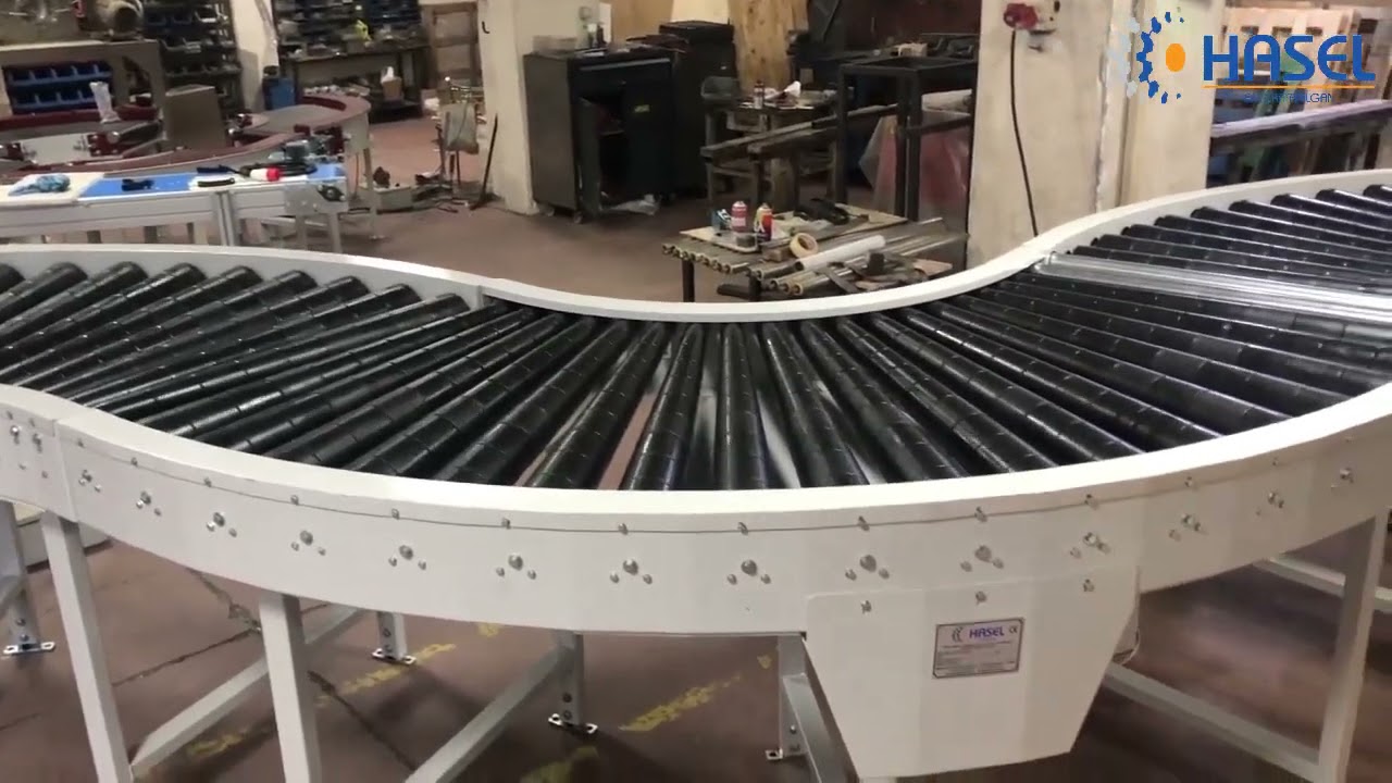 CONVOYEURS TOURNANT À ROULEAUX