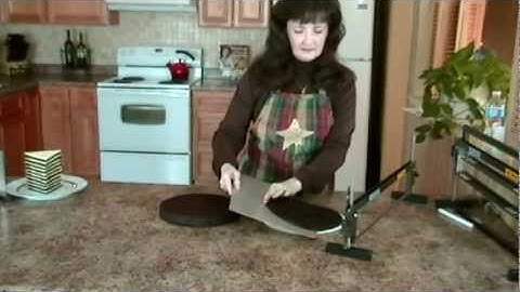 Agbay Cake Leveler cutting a thin layer