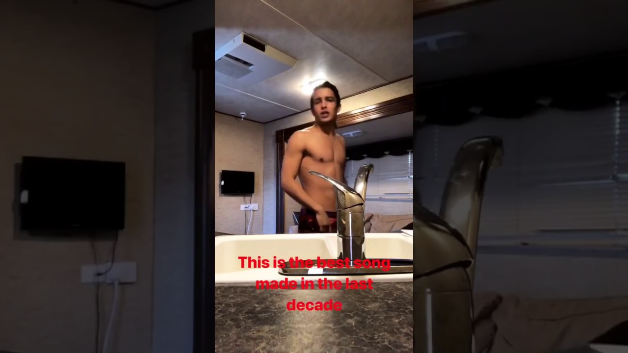 Shirtless Aramis Knight sings in the bathroom. 