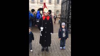 Charlie smacking the queens guards bum