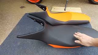 KTM 890 SMT power parts seat. how to install, And is it any different to the standard seat???