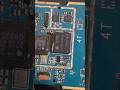Removing an IC from the board.