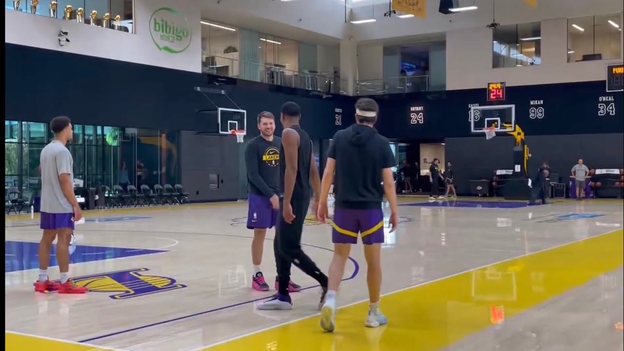 Luka Doncic participating in a half court competition at the end of ...