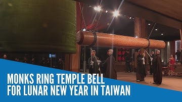 Monks ring temple bell for Lunar New Year in Taiwan
