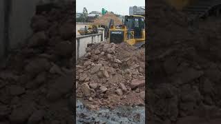 Incredible Big Machine Bulldozer Pushing Stone Dirt Clearing Mud &amp; Land Fill  Connect To Public Road