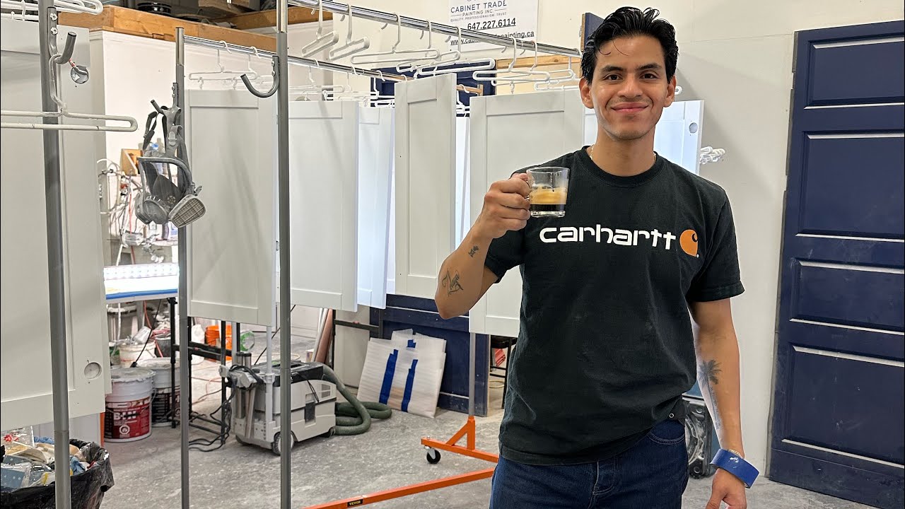 Sanding primer on kitchen cabinets at our spray shop before we spray the finish! 