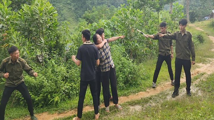 To save their lives, the criminal group took Ms. Dung hostage to threaten the police.