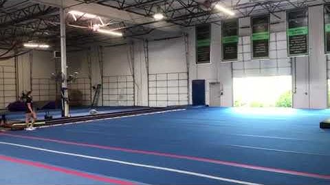 Front tuck step out, round off, back handspring, full