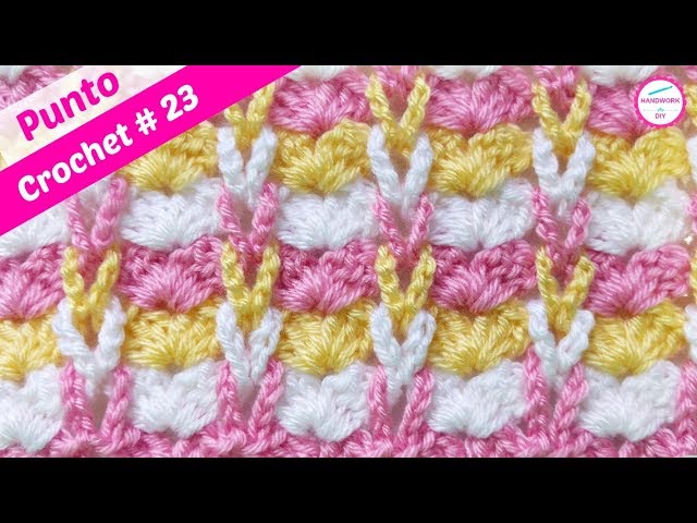 PUNTO CROCHET CON TRENZAS EN RELIEVE Y ABANICOS  23