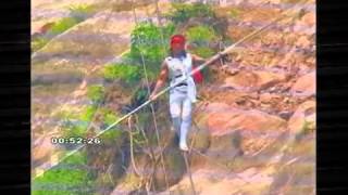 Chinese Tightrope Walker Aisikaier Survives Fall