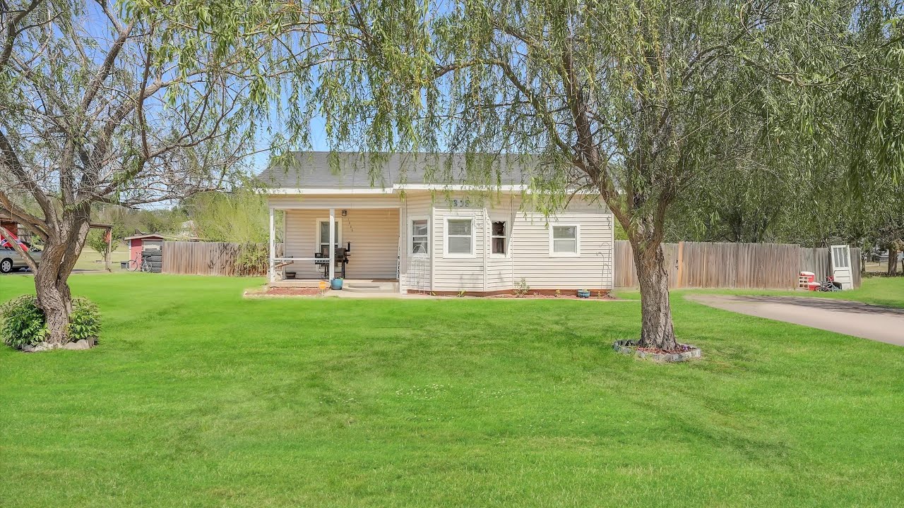 Three Bedroom Home In Elk City On Multiple Lots With A Large Wooden