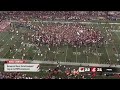 Washington State fans storm the field after beating #19 Wisconsin