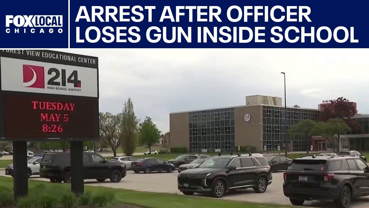 Person of interest in custody after officer's gun stolen at