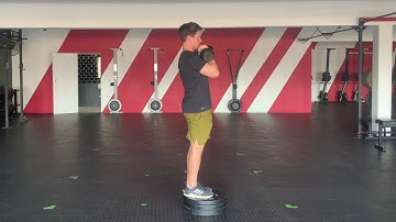 KB Front Rack Deficit Reverse Lunge