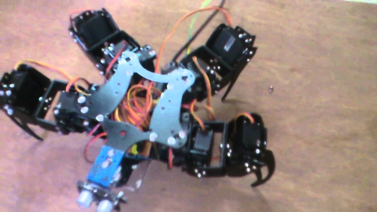 Quadruped Robot with body IK - YouTube