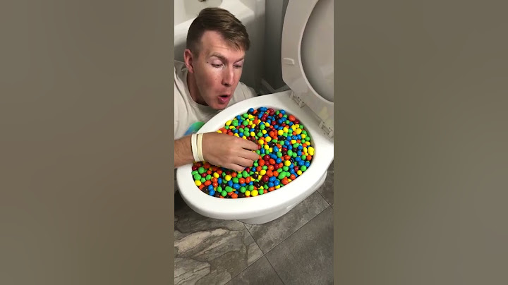 Eating M&Ms Reeses Candy in Toilet #shorts #mukbang