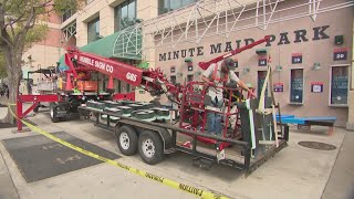 Minute Maid Park signs being replaced with Daikin Park signs at Astros' home
