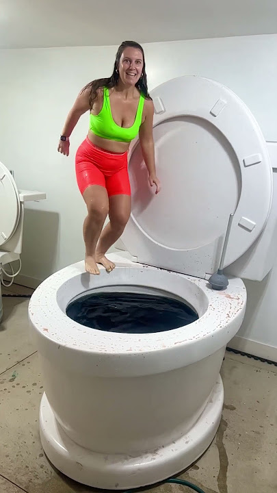 HIGHEST JUMP Slow Motion into Worlds Largest Giant Toilet Black Pool with BIG SPLASH #shorts