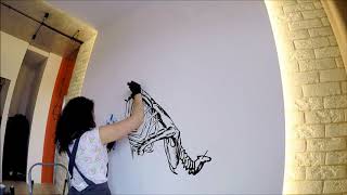 Graphics on the wall. Bird skeleton  brend.mira