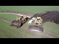 Big D11 bulldozers at work on farm