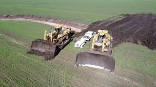 Big D11 bulldozers at work on farm