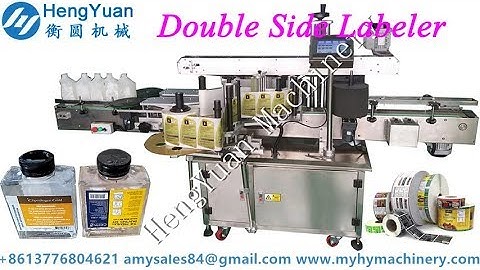 Double side labeling machine for flat glass bottle label applicator