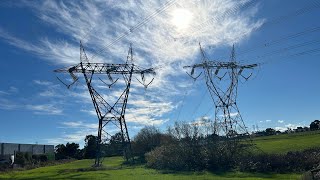 2 giant 500KV transmission line towers. - pylons #8 (landscape videos)