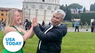 Pranksters high five tourists posing with Leaning Tower of Pisa | USA TODAY