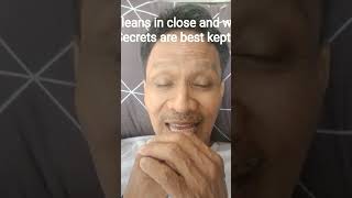 Subject leans in close and whispers 'Secrets are best kept'.