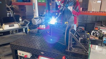 Overhead welding with rotational positioner