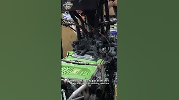 Workers are applying glue on the shoe integrated injection molding machine