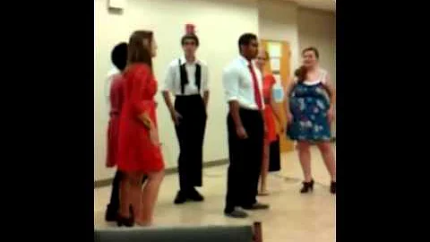 Josh Menzies and his a capella group singing "Home"