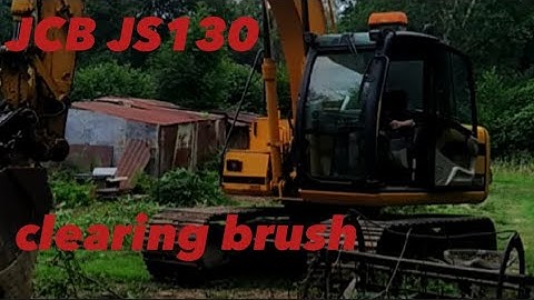 Clearing brush with the JCB js130