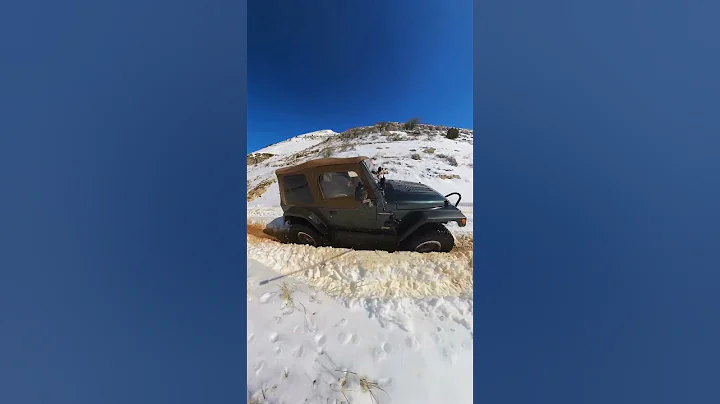 jeep Wrangler TJ on mud and snow