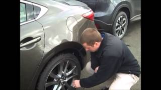 How to check tire pressure on a Mazda