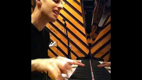 David Rosenthal playing piano in the studio