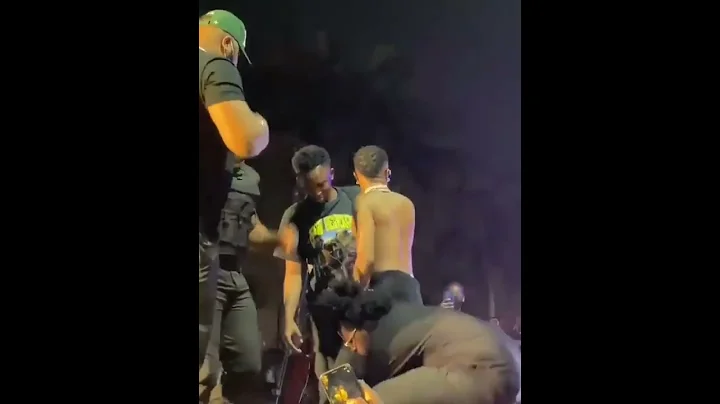 "Bring him back" – Wizkid tells bouncers dragging fan who tore his cloth in Abuja