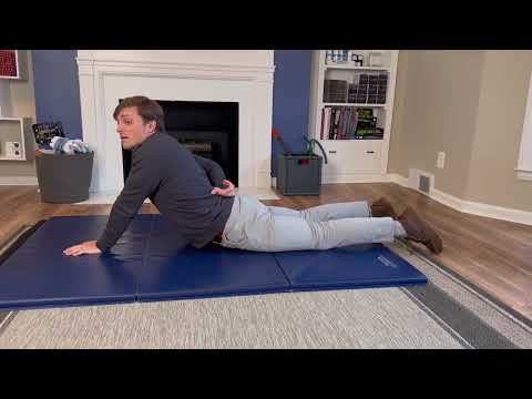 Extension in Lying for the Thoracolumbar Spine (Peel up) — McKenzie Method Exercise Reference