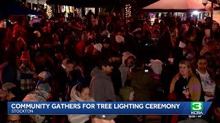 Stockton community finds unity, hope at annual Christmas tree lighting
