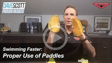 Swimming Faster: Freestyle with Two Paddles