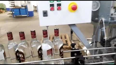 ENOLMAC SRL - TAX STRIPS LABELING MACHINE AUTOMATIC mod S75/4