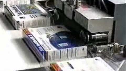 Shrink wrapping of a carton -- Shanklin F 5 Side Sealer