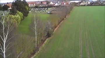 Testing the altitude of a Syma X5C-1 ... and then, this!